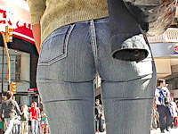 Damn, what a hot babe in tight blue jeans and sunglasses! The urge to grab her delicious ass was almost irresistible!