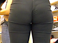 Teen babe unknowingly demonstrates her girls ass in tight jeans while she is looking for boots in a shoe store. Watch her jeans booty