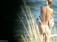 This nudism lady does not know anything about the camera guy voyeuring her from the bushes.
