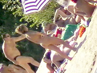 The common nudist life with various entertainments on the beach was hot on the voyeur camera for your pleasure