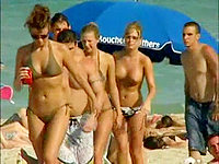 All the guys on the beach cant stop looking at these pretty gadgets in the sexy bikini panties.