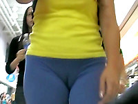 That babe isn't really slim or well-shaped, but her super tight cameltoe is definitely worth seeing! Check it out now!