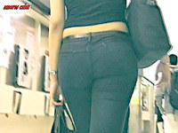 I can tell this chick likes to attract attention! Just look at her hair color! But I was attracted by her ass in tight black jeans