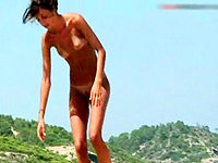 The body of this very slim nudist woman looks natural and absolutely hot.
