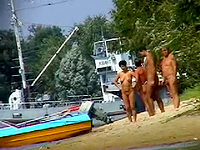 A group of real nudists are on the beach having no shame to demonstrate the nude bodies even on our hunters camera
