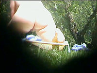 The insolent guy with camera was hiding in the bushes recording the ugly body of the chubby nudist woman