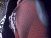 Fishnet pantyhose upskirt will turn you on for sure, especially when you see cute black panty peeping through girls fishnets