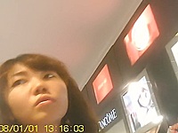Very charming Asian bimbo has no idea that the man following her prefers admiring her hot looking chinese upskirt recording every detail on the working camera.