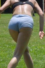 hot chick bends over in shorts